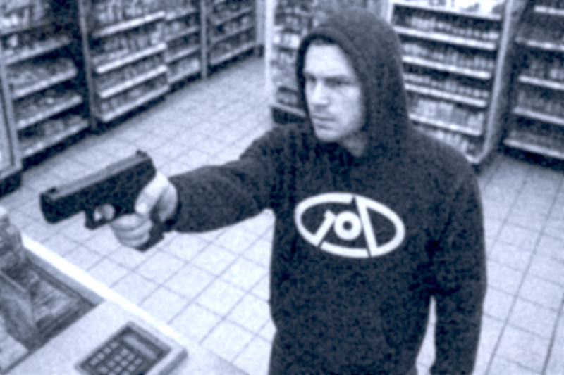 ISONERV | GOD | Streetwear | Artist | cctv | a hold up with a gun in a convenience store, man wearing hoodie